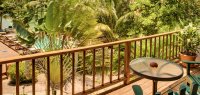 Gartenanlage von The Inn at Robert´s Grove in Belize
